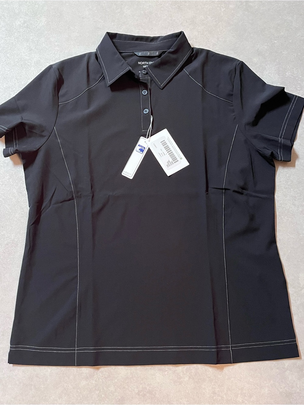 North End black polo contrasting stitching
Large
New. Tags on